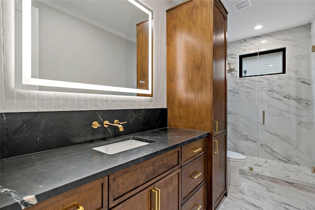 bathroom with visible vents, vanity, toilet, marble finish floor, and a marble finish shower