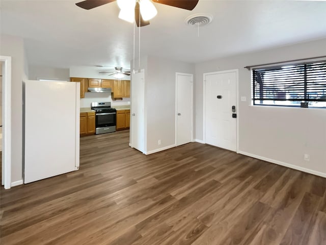 unfurnished living room with dark wood-type flooring