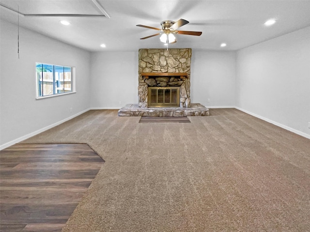 712 Brookfield Dr, Hurst, TX 76053 - unfurnished living room featuring ceiling fan, recessed lighting, baseboards, attic access, and a fireplace