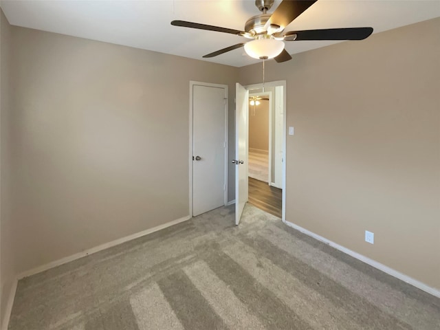 712 Brookfield Dr, Hurst, TX 76053 - unfurnished room with a ceiling fan, carpet floors, and baseboards