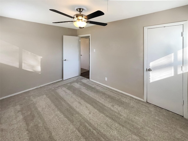 712 Brookfield Dr, Hurst, TX 76053 - unfurnished bedroom with carpet, baseboards, and ceiling fan
