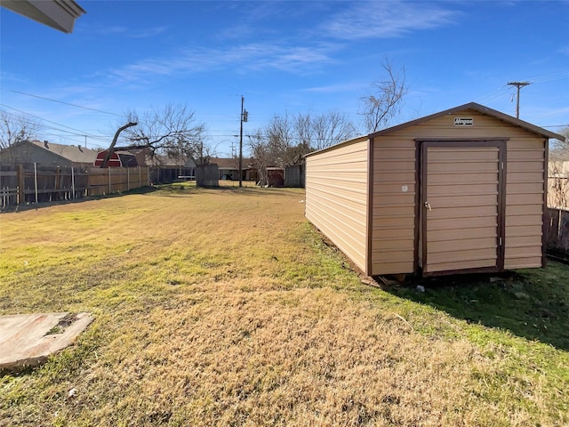 view of yard with a storage unit