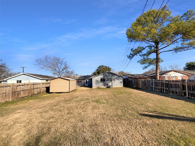 view of yard with a storage unit