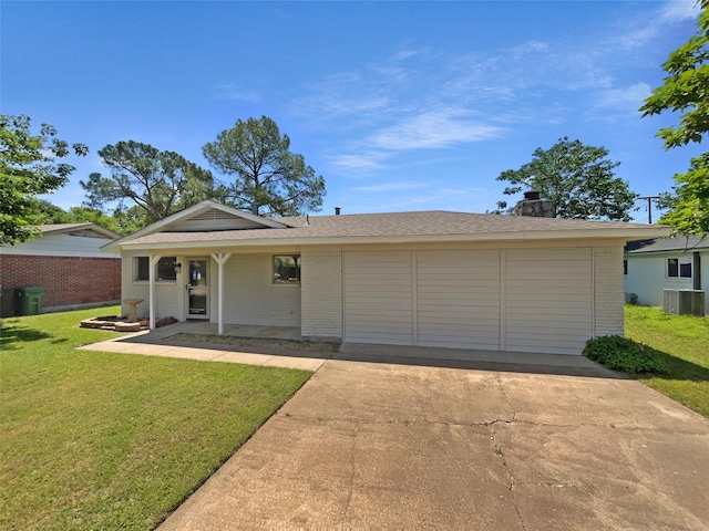 712 Brookfield Dr, Hurst, TX 76053 - view of front of home featuring central air condition unit, brick siding, driveway, and a front yard