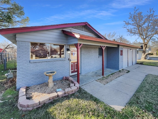 view of front of home featuring a garage