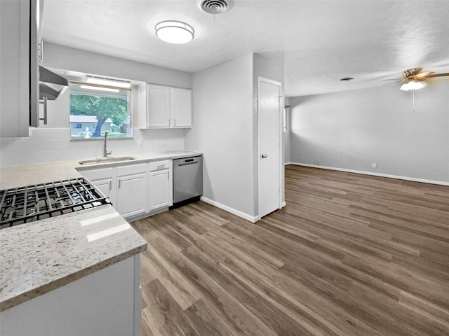 712 Brookfield Dr, Hurst, TX 76053 - kitchen featuring a sink, dishwasher, white cabinets, and ceiling fan