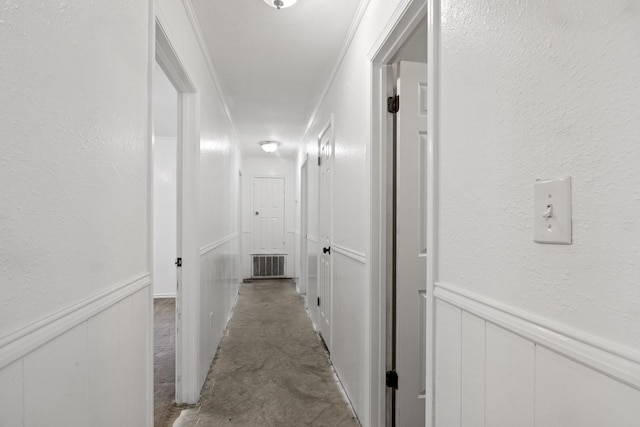 hallway with crown molding