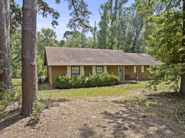 ranch-style home featuring central air condition unit