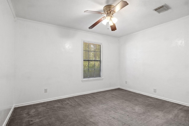 carpeted empty room with crown molding and ceiling fan