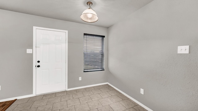 view of tiled spare room