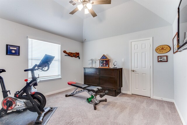 carpeted bedroom with vaulted ceiling and ceiling fan