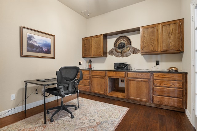 office with dark hardwood / wood-style flooring