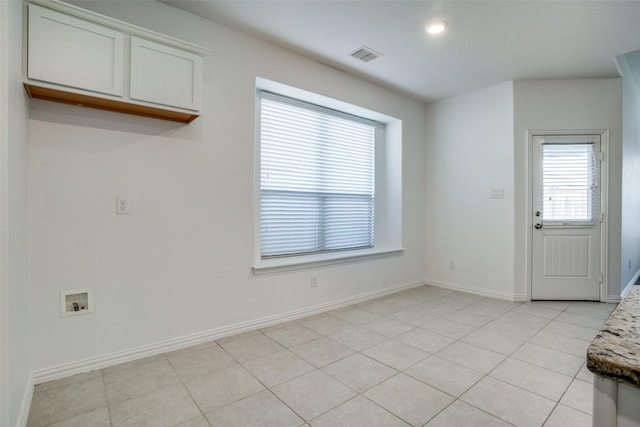 interior space with light tile patterned flooring