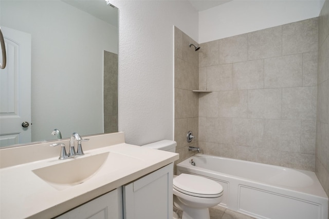 full bathroom with vanity, toilet, and tiled shower / bath combo