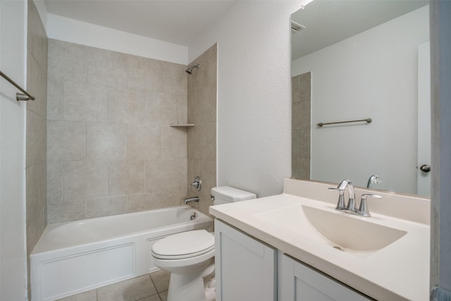 full bathroom featuring tiled shower / bath combo, vanity, tile patterned flooring, and toilet