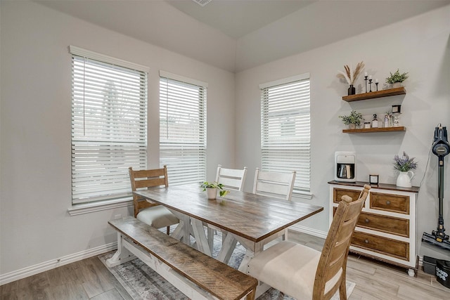 dining area with light wood-type flooring