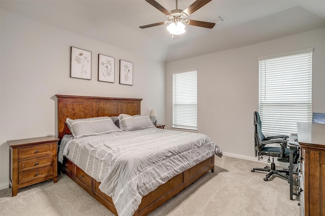 bedroom with light carpet, lofted ceiling, and ceiling fan