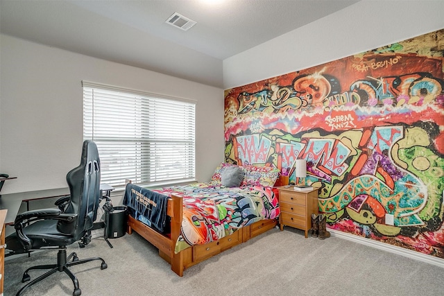 bedroom with lofted ceiling and light carpet