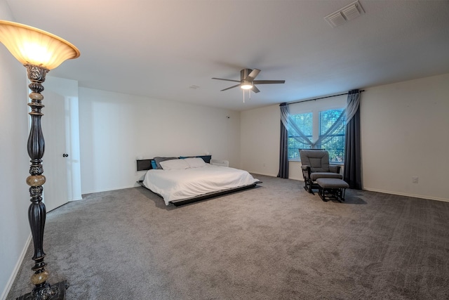 bedroom with ceiling fan and carpet floors