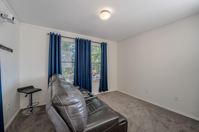 bedroom featuring carpet, a large fireplace, and ceiling fan