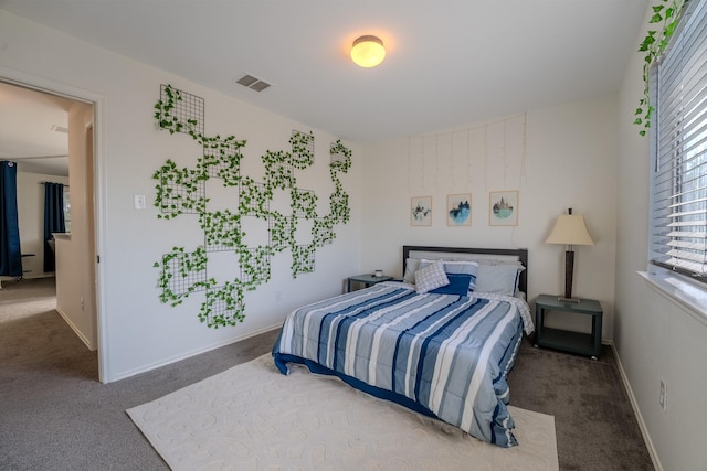 7935 Faithful Trl, Dallas, TX 75237 - bedroom featuring baseboards, carpet, and visible vents