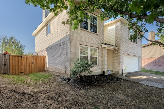 exterior space with a garage