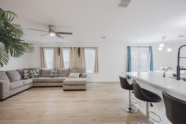 kitchen featuring light stone counters, white cabinetry, and appliances with stainless steel finishes