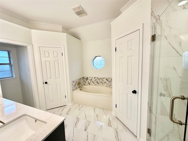 bathroom with ornamental molding, vanity, and separate shower and tub