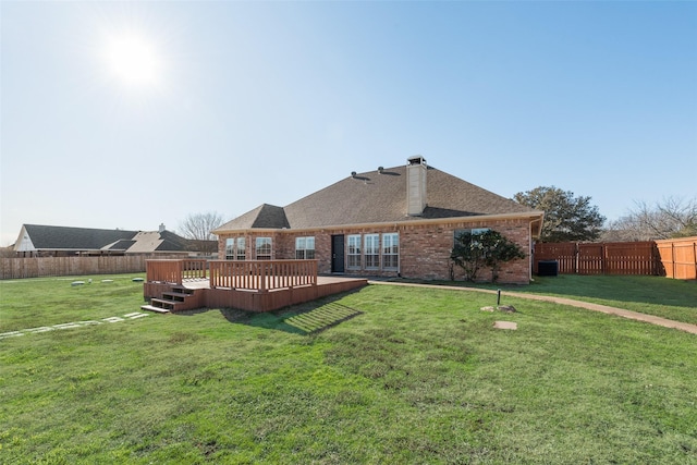 back of property featuring a wooden deck, a lawn, and central air condition unit