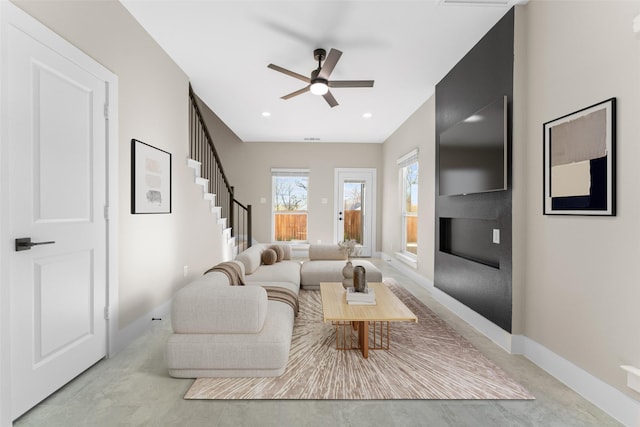 living room featuring ceiling fan