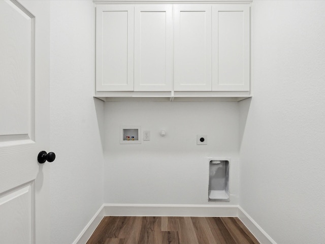 laundry area with dark wood-type flooring, cabinets, washer hookup, hookup for a gas dryer, and hookup for an electric dryer