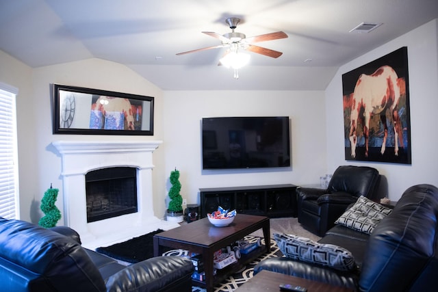 living room with vaulted ceiling and ceiling fan