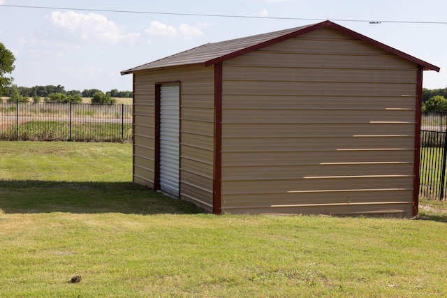 view of outdoor structure with a yard