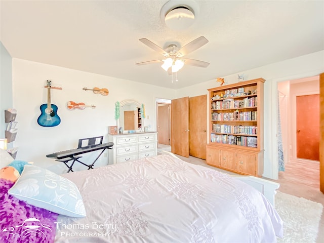 bedroom featuring ceiling fan