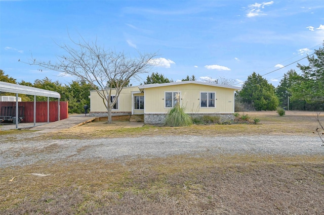 manufactured / mobile home featuring a carport