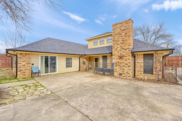 rear view of house featuring a patio area