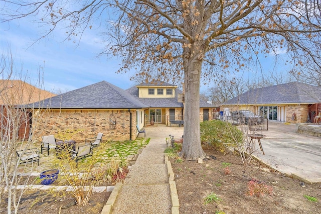 view of front of property with a patio