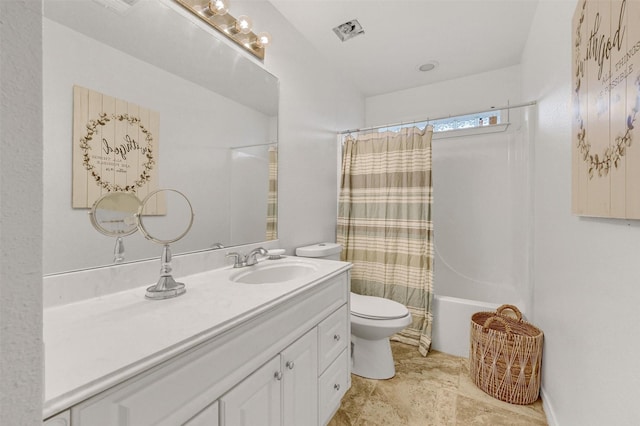 full bathroom featuring vanity, shower / bathtub combination with curtain, and toilet