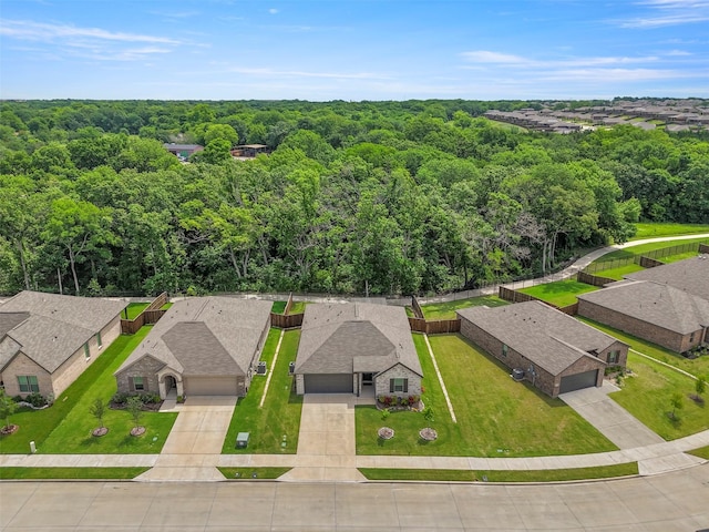 2313 Atlantic Ave, Anna, TX 75409 - aerial perspective of suburban area featuring a heavily wooded area