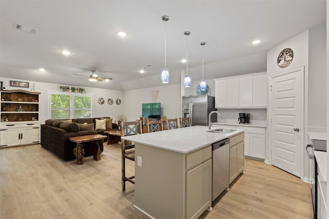2313 Atlantic Ave, Anna, TX 75409 - kitchen with appliances with stainless steel finishes, a sink, light wood-type flooring, recessed lighting, and ceiling fan