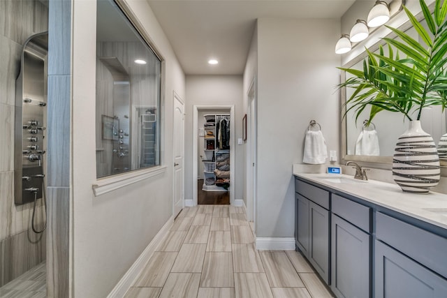 bathroom featuring vanity and walk in shower