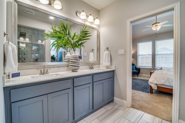 bathroom with vanity and ceiling fan