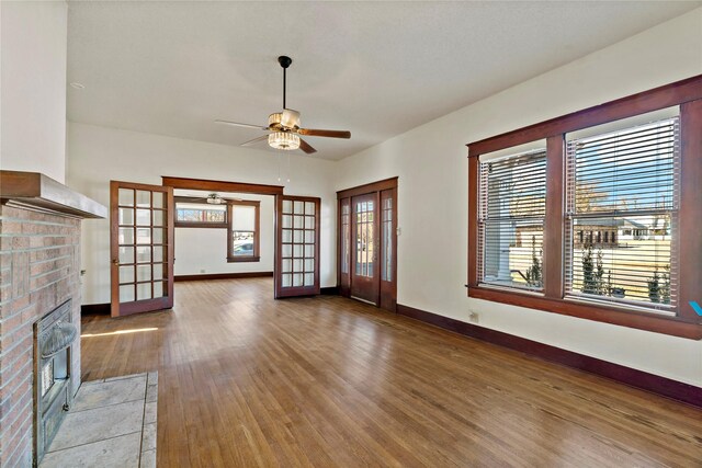 empty room with ceiling fan, ornamental molding, and hardwood / wood-style floors