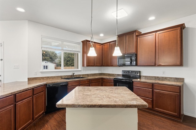 kitchen featuring black appliances, dark wood-style flooring, a sink, and recessed lighting