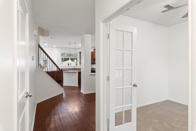 hallway featuring hardwood / wood-style floors