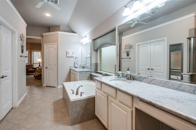 bathroom with tiled bath, tile patterned flooring, vanity, ceiling fan, and crown molding