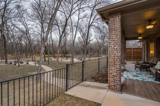 view of patio featuring ceiling fan