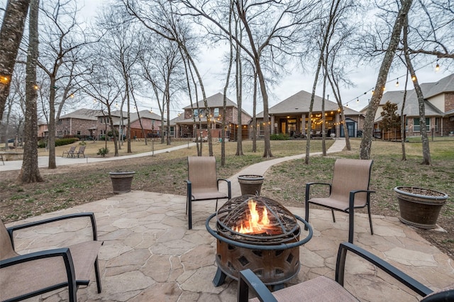 view of patio / terrace featuring a fire pit