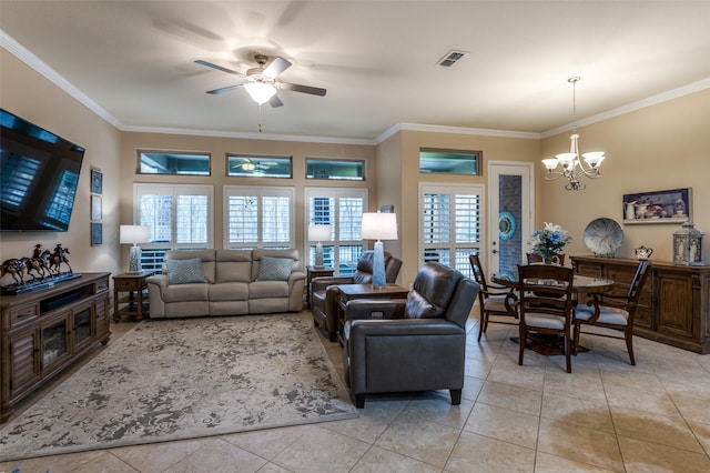 living room featuring crown molding, ceiling fan with notable chandelier, a healthy amount of sunlight, and light tile patterned floors