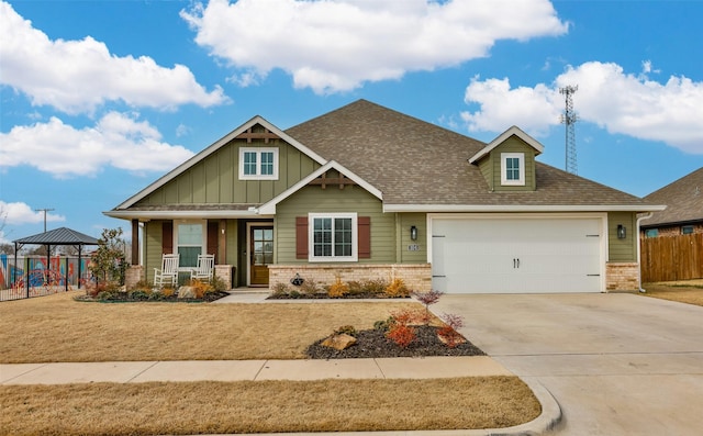 craftsman house with a garage, a gazebo, and covered porch